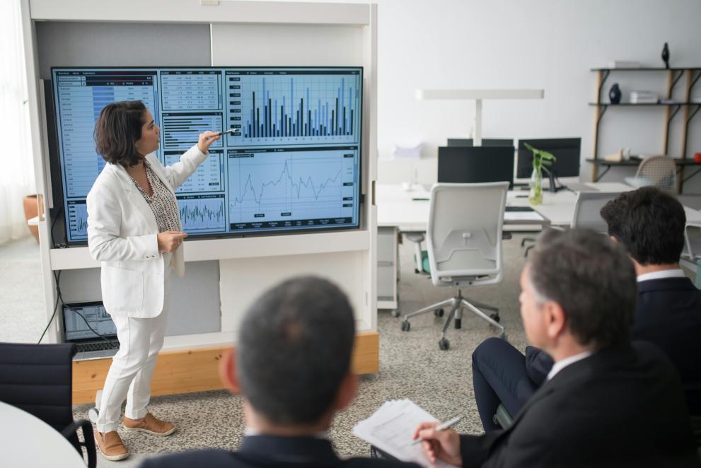 Woman explaining graphs